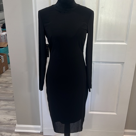 ⭐️SOLD⭐️ Bebe s black dress w/built-in bra,sheer sleeves, and open back. - Picture 4 of 8